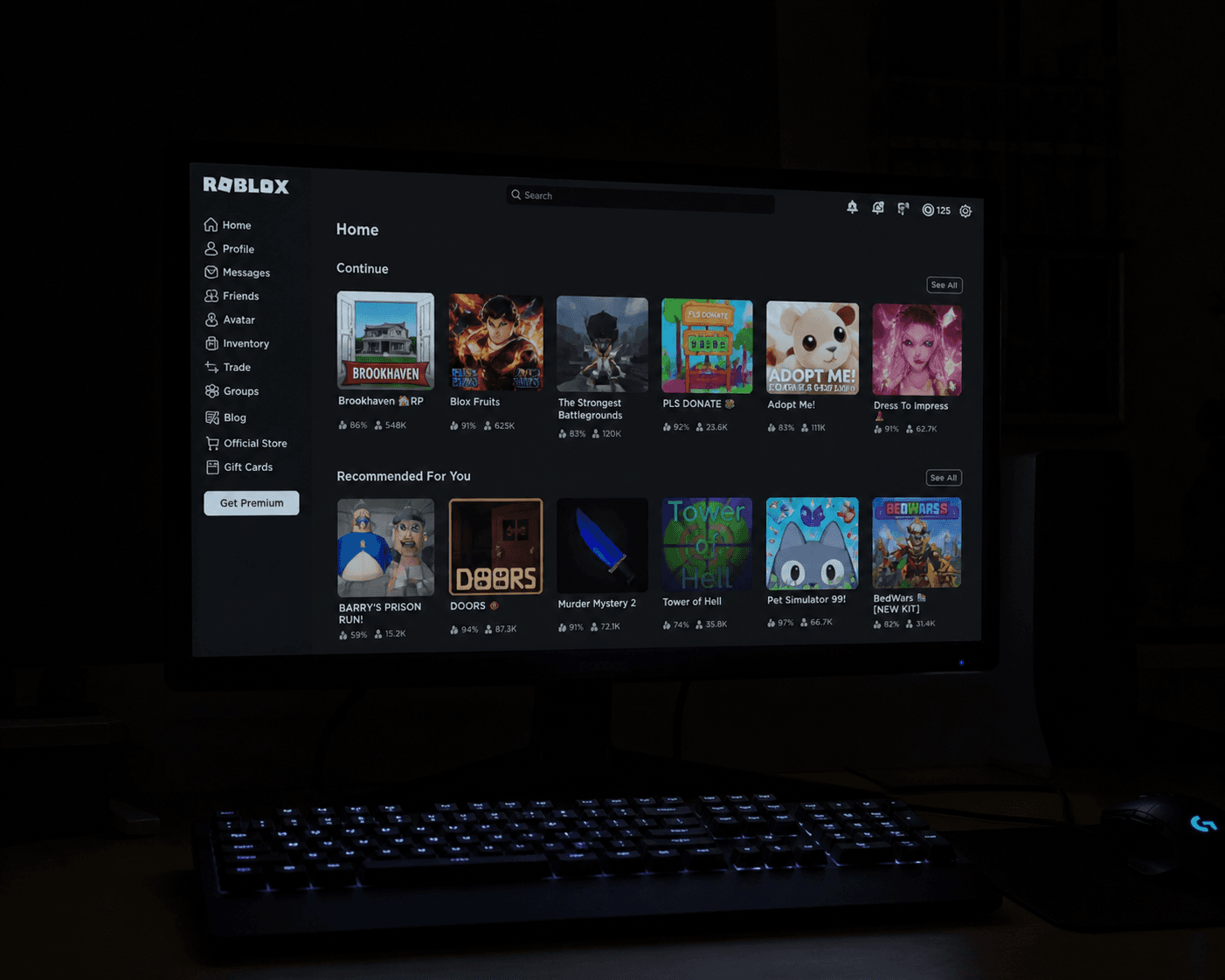 A child’s monitor lit up with Roblox late at night in a dark room